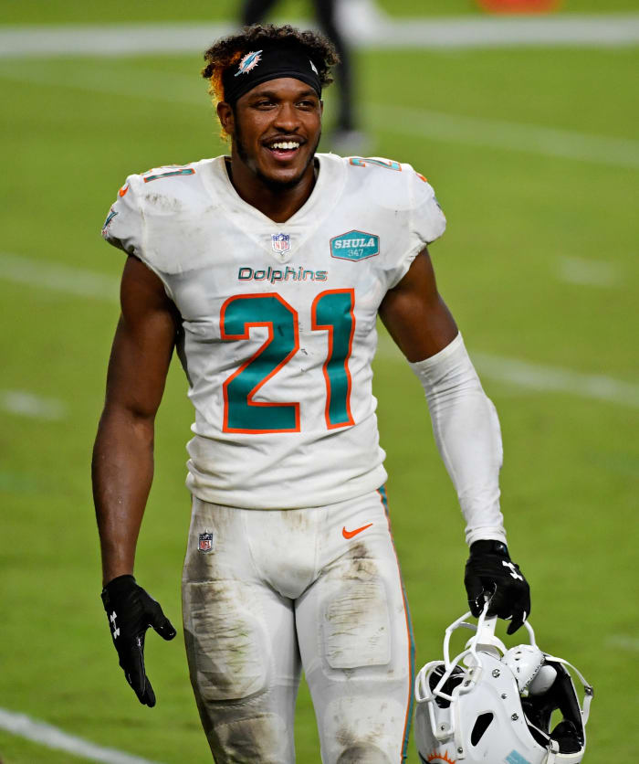 Oct 18, 2020; Miami Gardens, Florida, USA; Miami Dolphins free safety Eric Rowe (21) celebrates after defeating the New York Jets at Hard Rock Stadium.